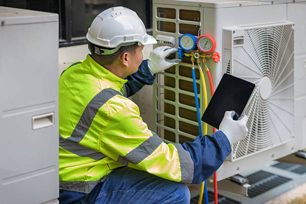 Professional Air Duct Cleaning technician working in Dayton, MD